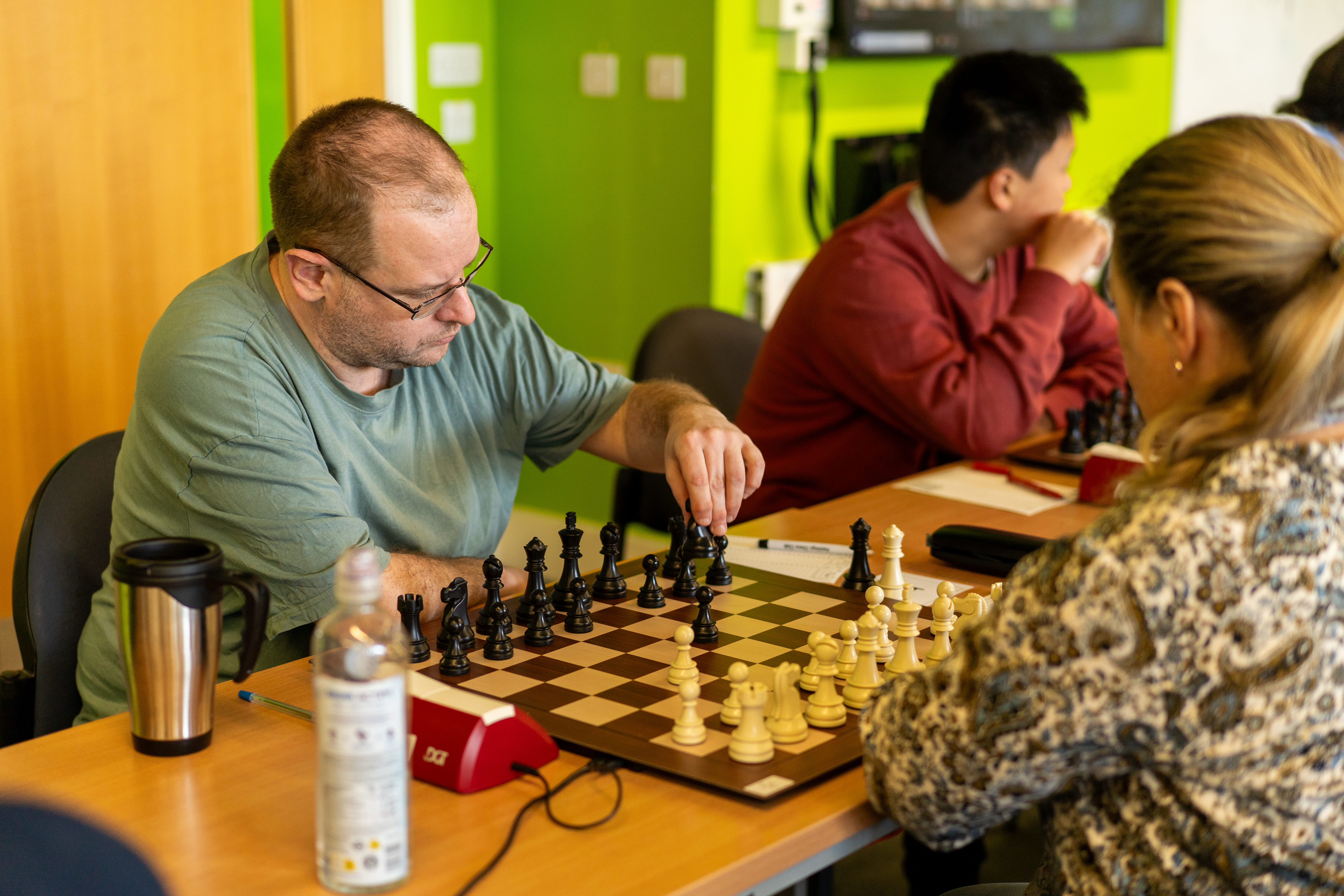 Players focused during a round at the congress